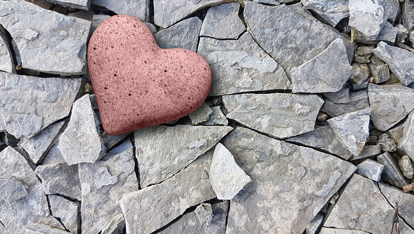 heart rock on broken rocks